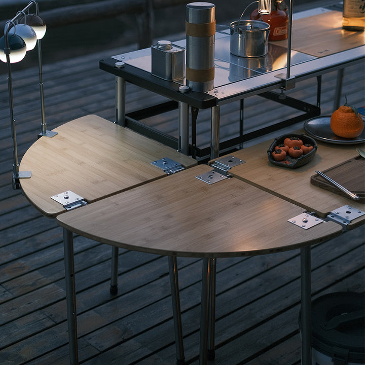 Closeup of an IGT table setup consisting of a frame, two bamboo corner tables, and one bamboo extension table